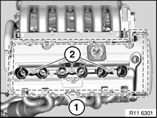 Remove the valve cover mounting bolts