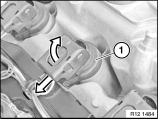 Unclip the coil, unplug it and remove it from the spark plug tube