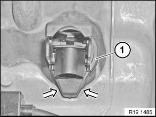 Install a new coil in the spark plug tube and use the palm of your hand to press down on it until it is seated firmly on the spark plug.