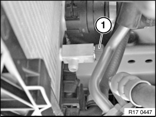 radiator with drain plug - unscrew plug and drain coolant