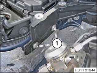 remove the bolts anchoring the right engine partition