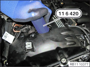 Use a 32mm deep socket to press the gasket into place as shown in the image