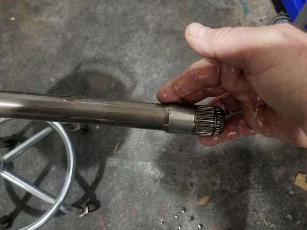 bmw e60 front axle shaft - Liberally apply lubricant to the axle shaft.
