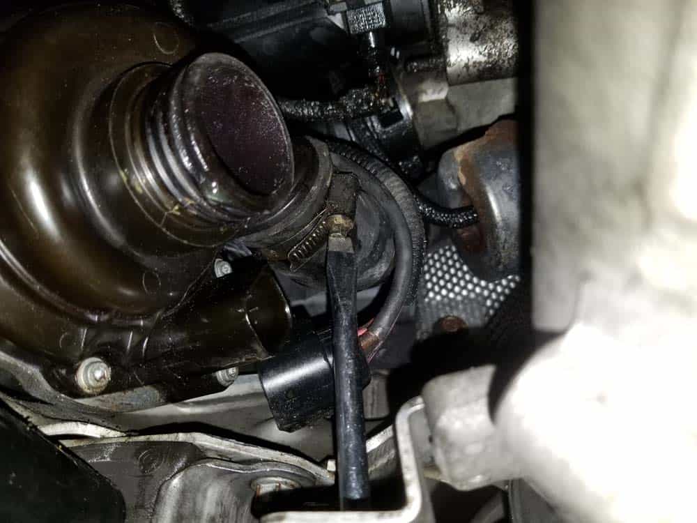 bmw e90 water pump replacement - Remove the engine block coolant line from the back of the pump