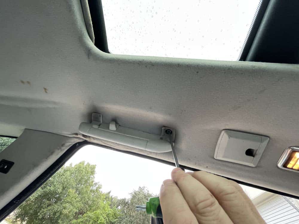 Remove the two rear ceiling handles
