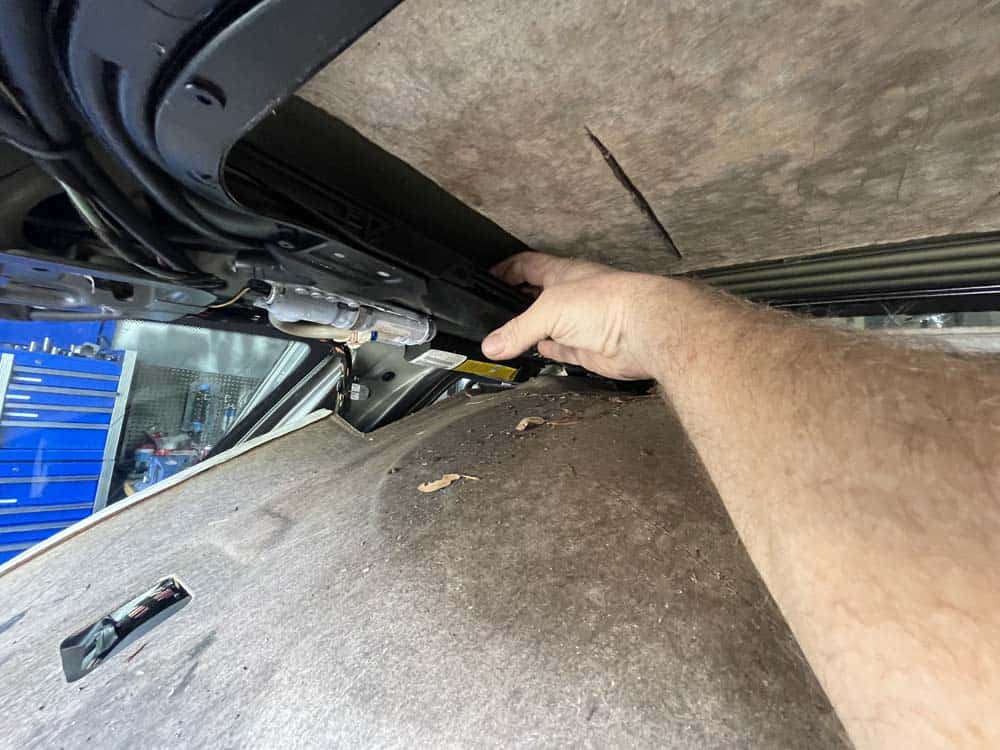 bmw e53 sunroof leak and drain cleaning - Reach up and thoroughly clean out the drain with your fingers