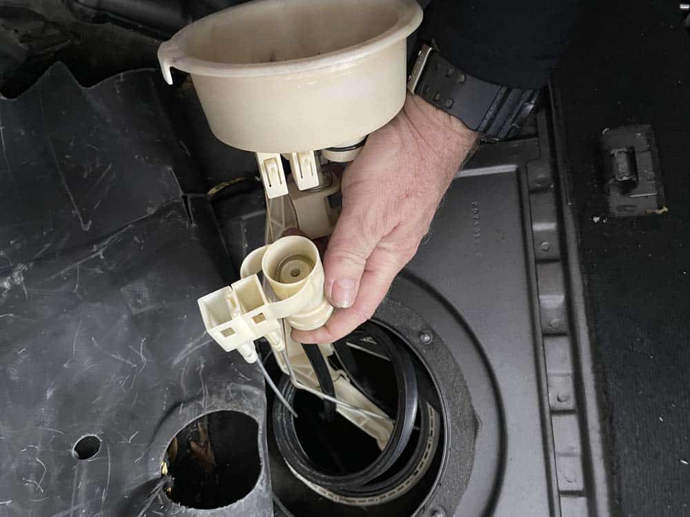 bmw e53 fuel pump replacement - Remove the lower fuel lines from the sensor