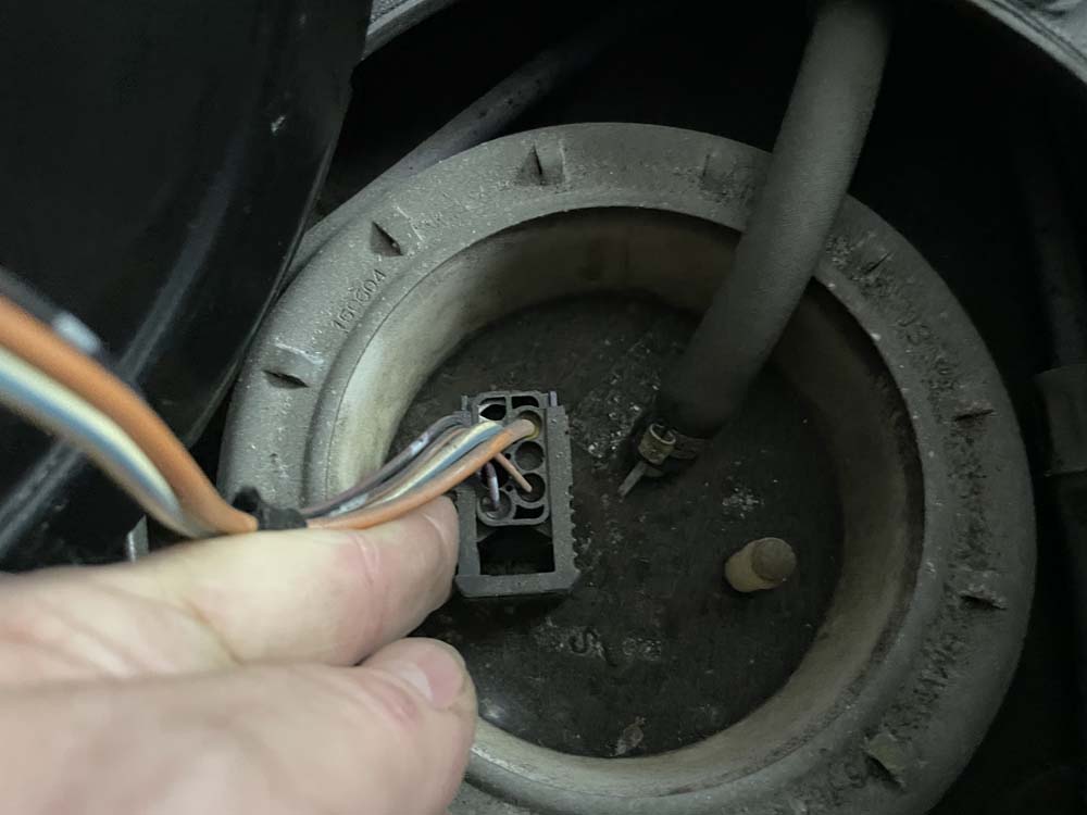 bmw e53 fuel pump replacement - Slide back the plastic lock on the fuel pump electrical connection