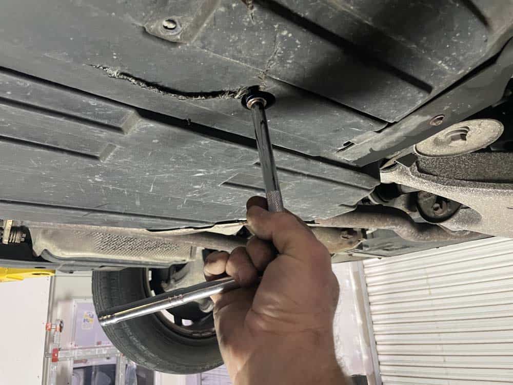 remove 13mm mounting bolt