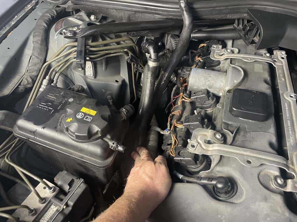 Tuck all of the coolant hoses out of the work area