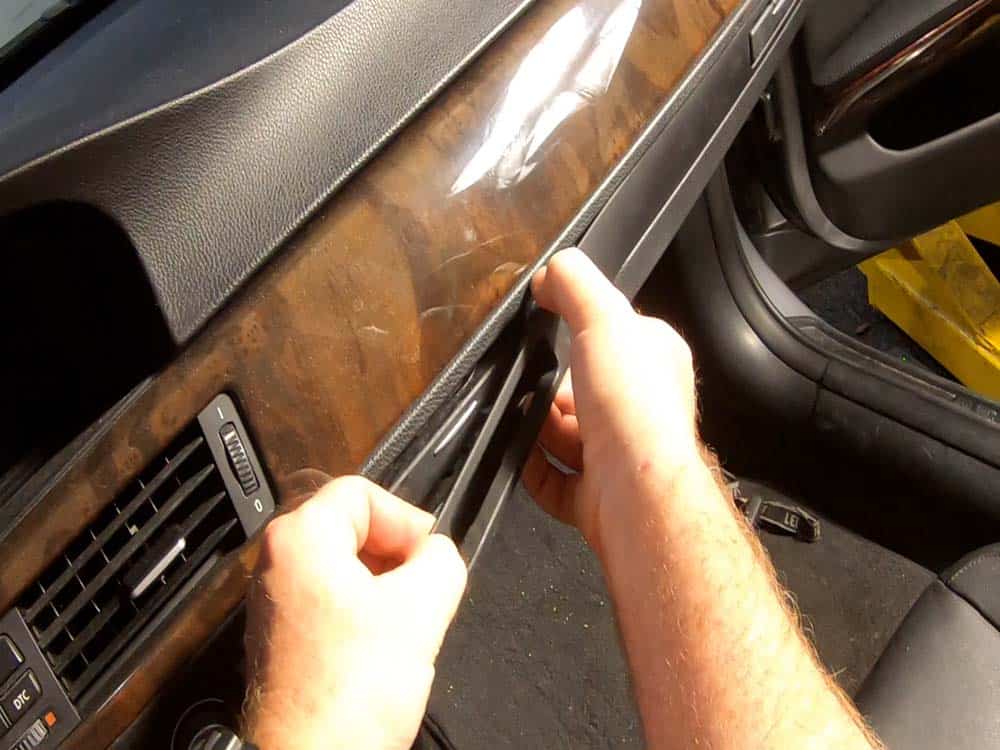 bmw e90 cup holder repair - Pull the cup holder trim off of the dashboard