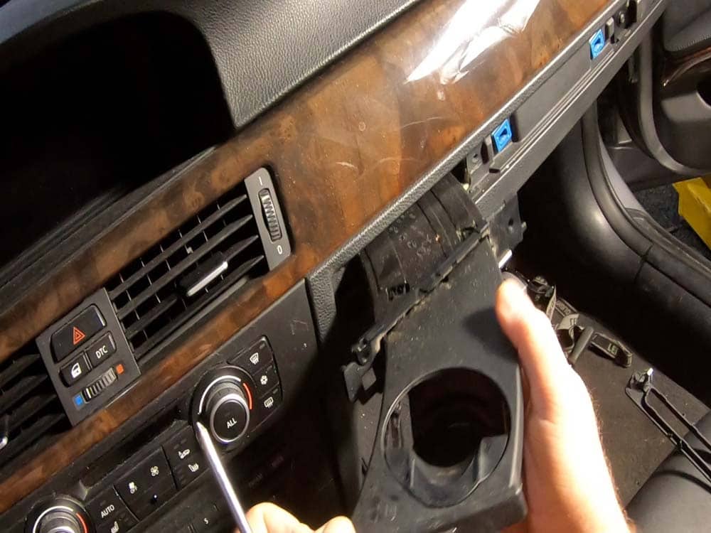 bmw e90 cup holder repair - Pull the old cupholder out of the dashboard