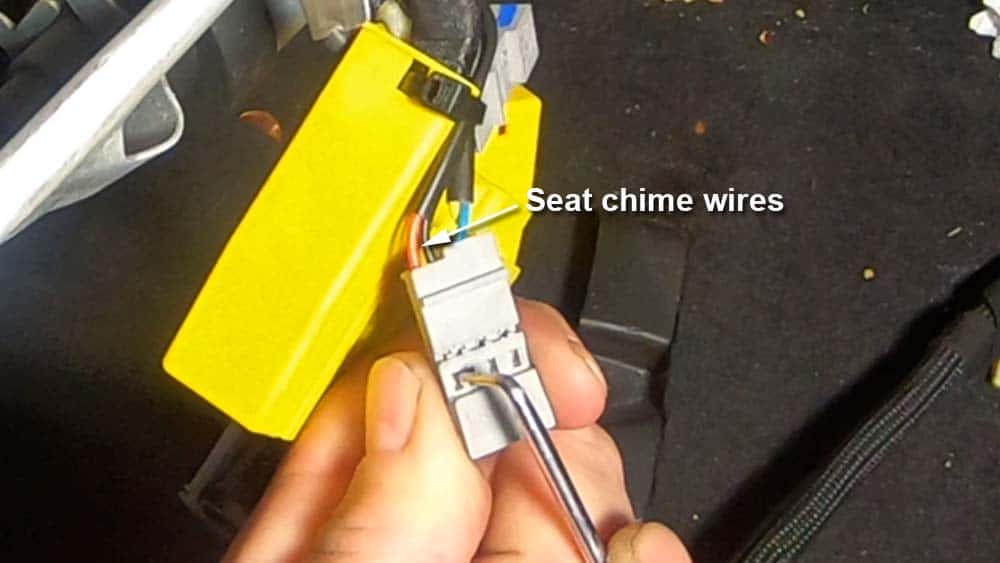 bmw e90 seat occupancy sensor repair - Use a metal pick to remove the red and black wires