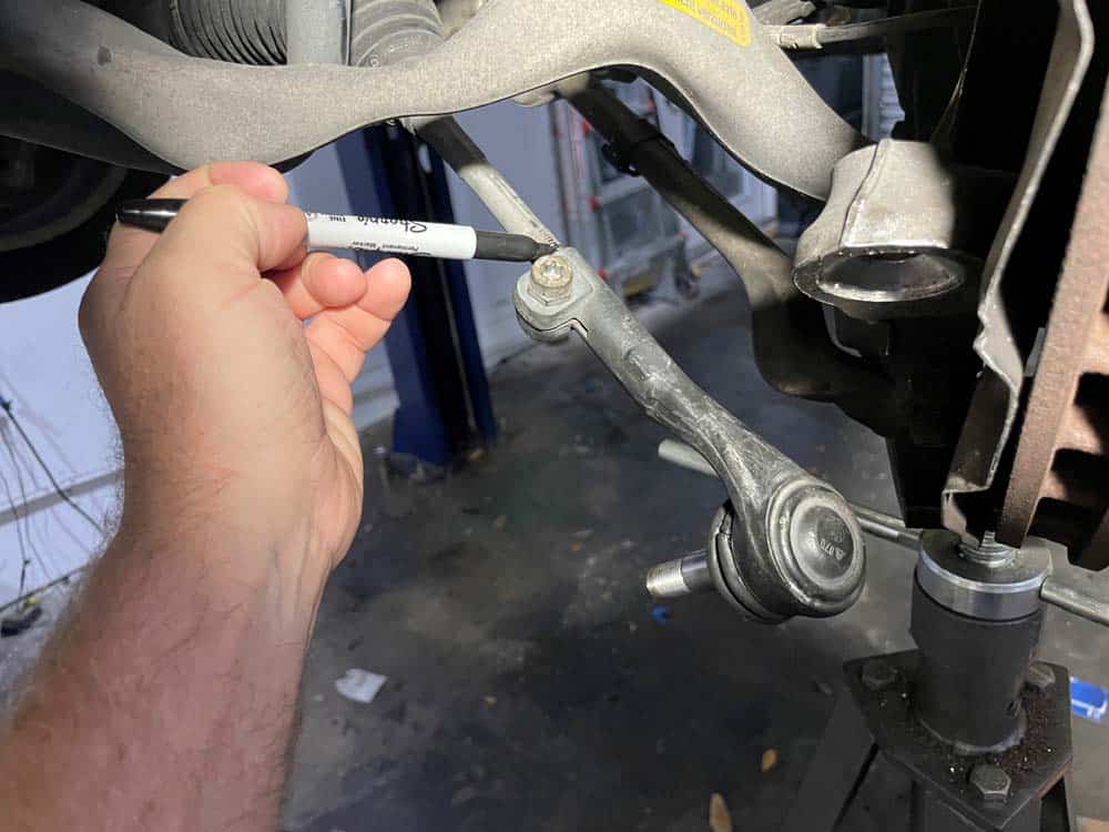 bmw e90 front strut replacement - mark the tie rod ball joint location with a sharpie