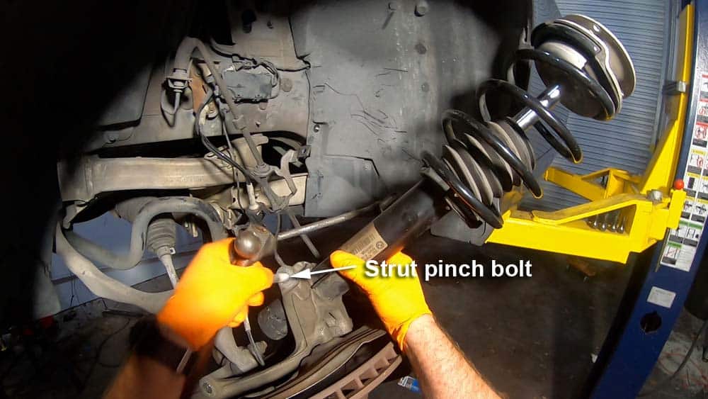 Remove the strut pinch bolt
