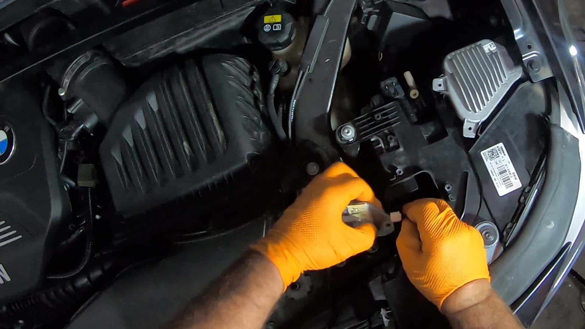 bmw x2 daytime running light replacement - unplug the electrical connector