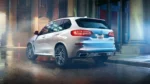 Rear-angle-view-of-white-2023-BMW-X5-highlighting-its-release-date-and-price