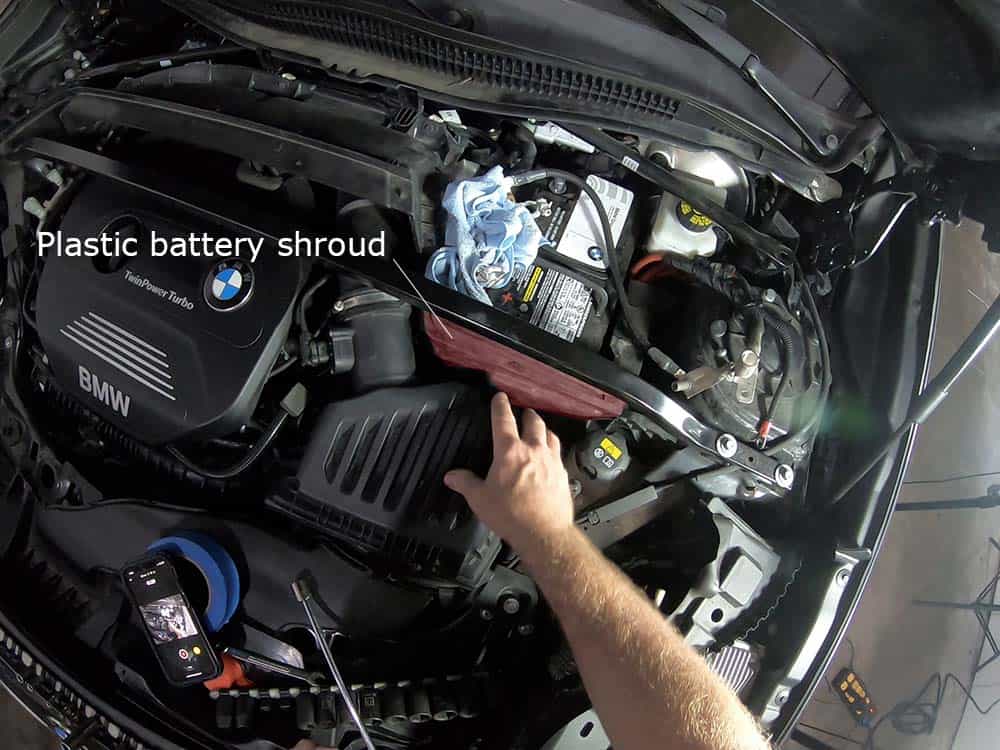 bmw x2 battery replacement - Locate the plastic battery shroud