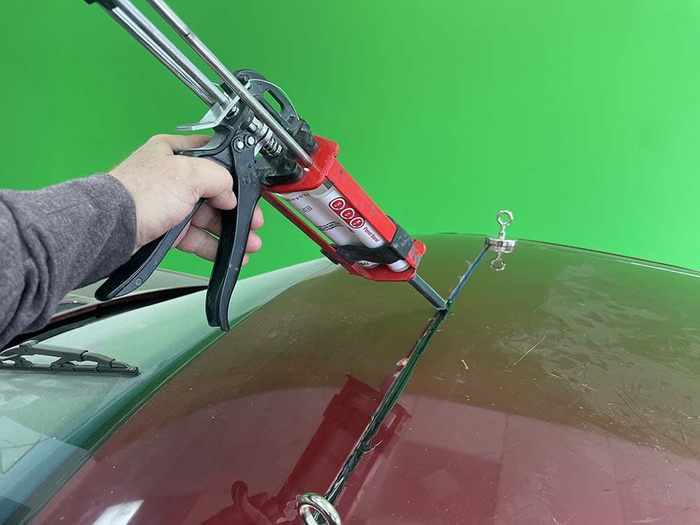 Fill the sunroof panel gap with <a href='https://amzn.to/3HG2IWW'>3M Body Panel Adhesive</a>