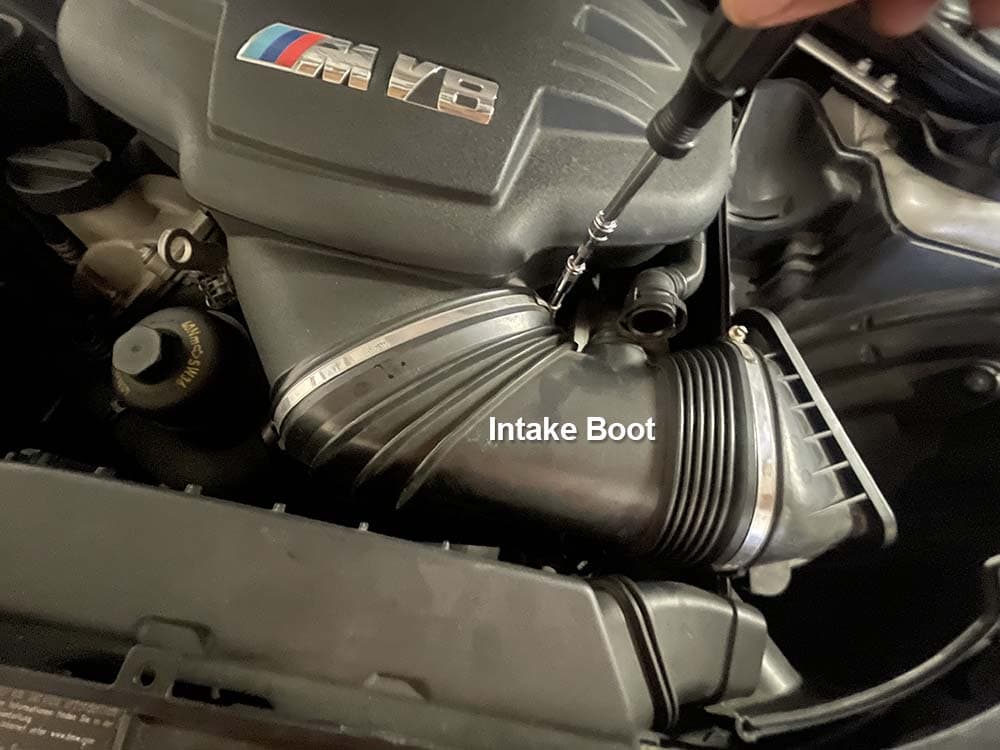 Loosen the hose clamp on the intake boot