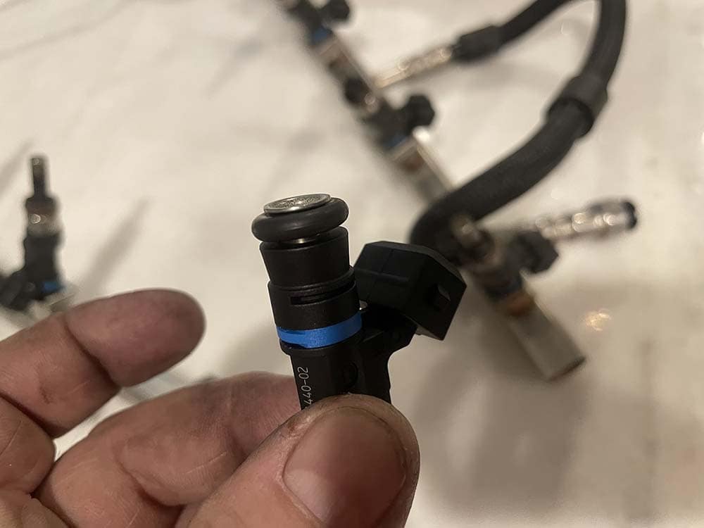 Confirm there is a new o-ring on the injector.